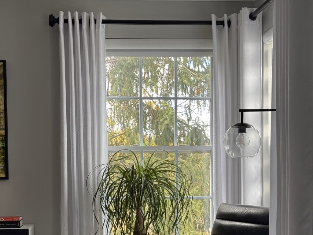ventus custom drapery and rods in a living room setting