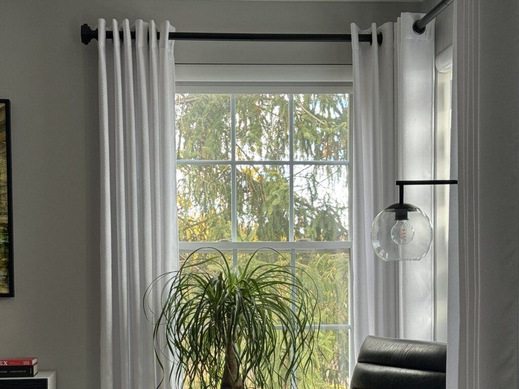 ventus custom drapery and rods in a living room setting