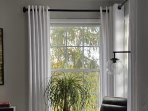 ventus custom drapery and rods in a living room setting