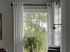ventus custom drapery and rods in a living room setting